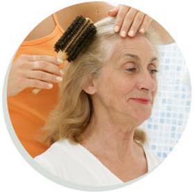 Picture of lady getting her hair done